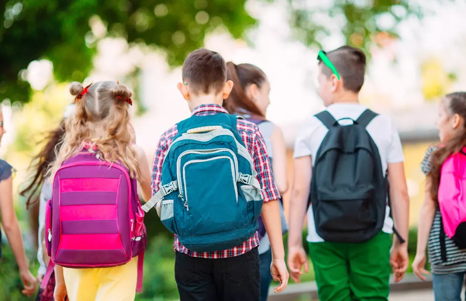Group of kids going to school together