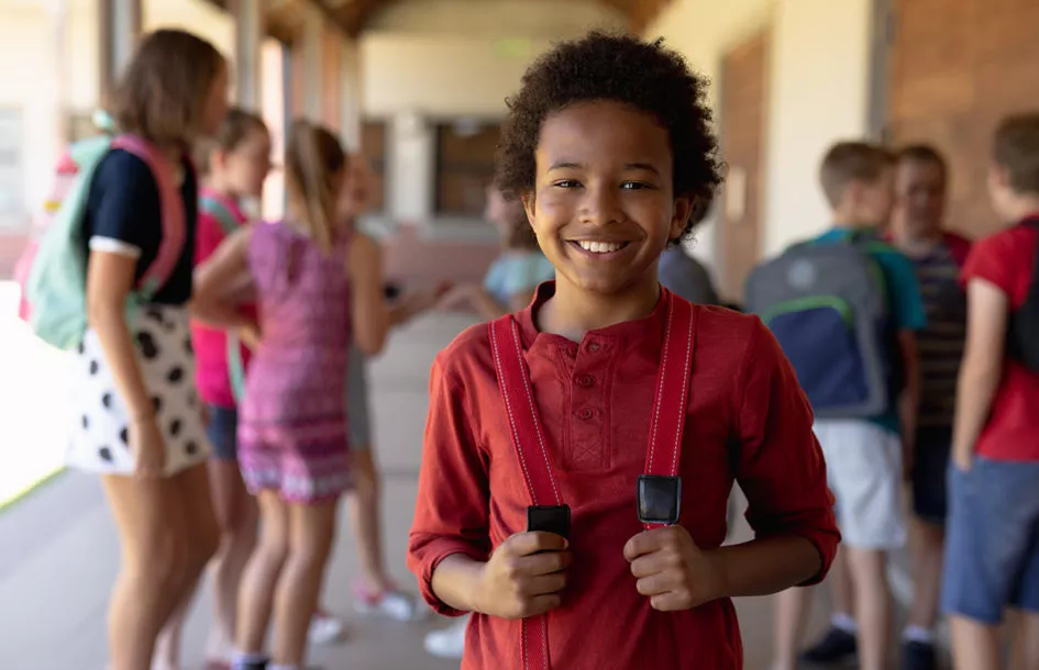School Aged Boy happy while attending an After-school program at a Rockville daycare.
