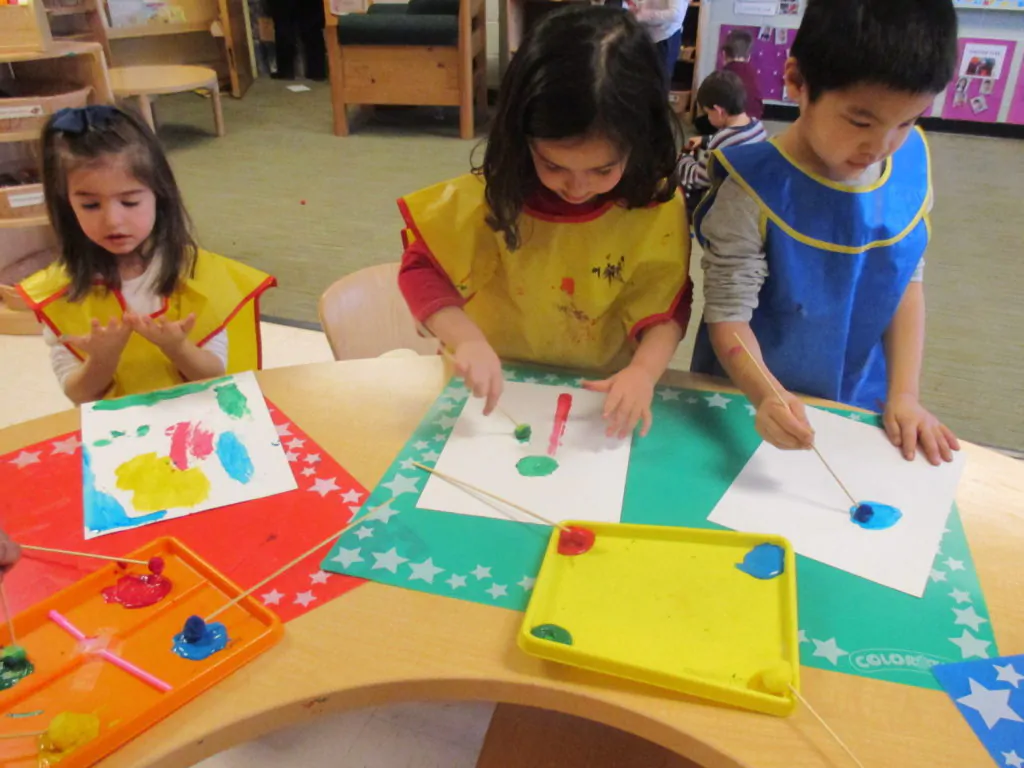 Kids participating in learning activities at a preschool program in Potomac, MD