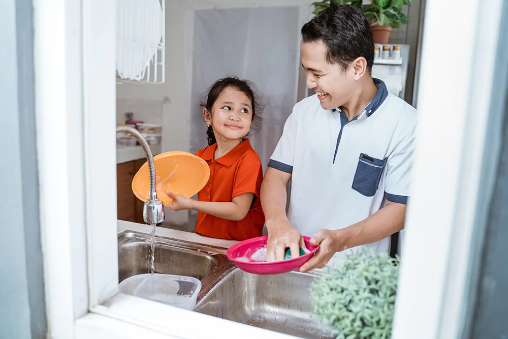 Kids helping with dishes