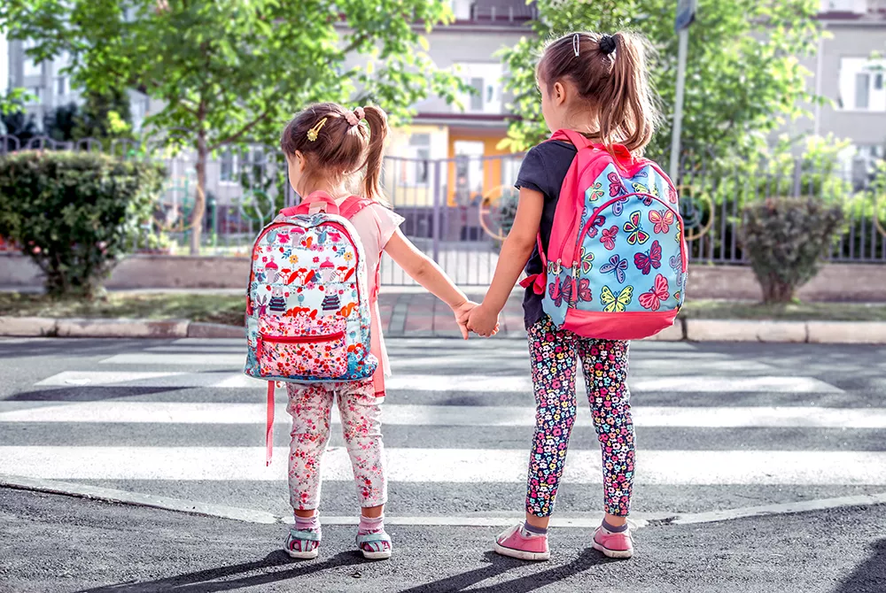 preschool kids with backpacks