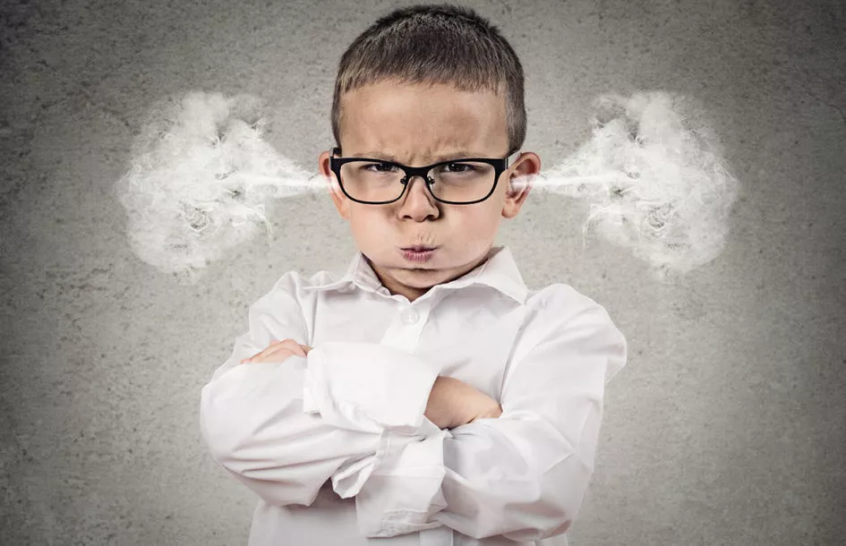 Closeup portrait Angry young Boy having a tantrum.