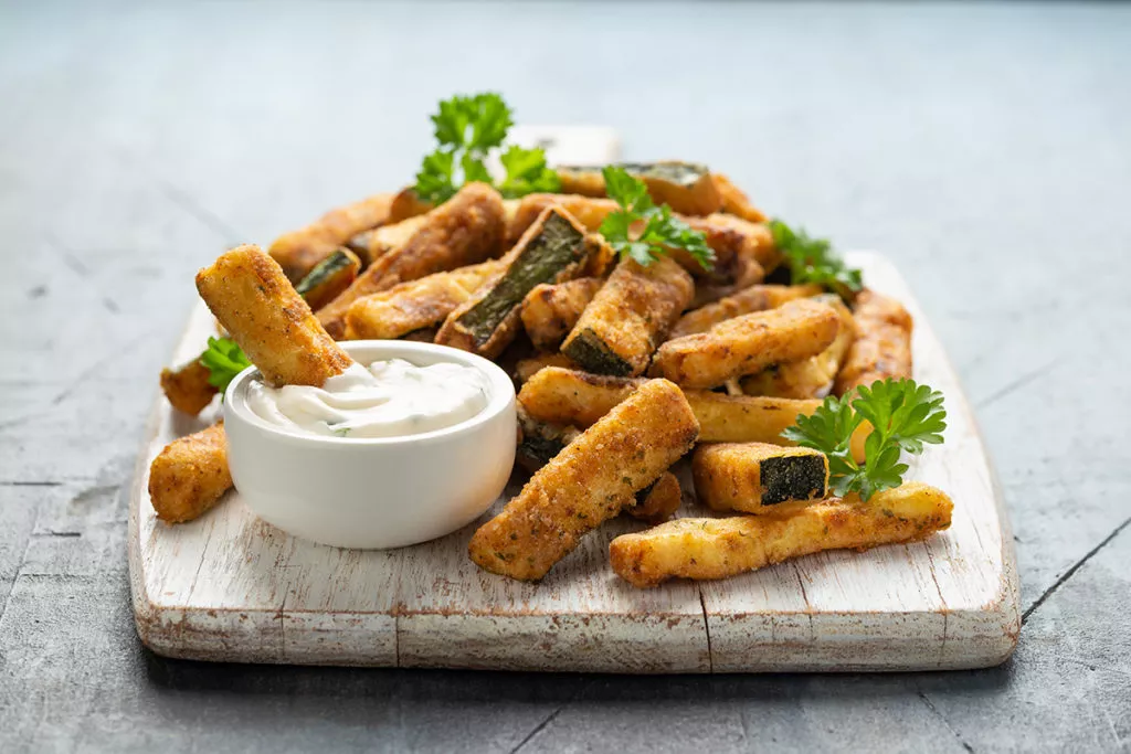 Healthy baked French fries on a plate.