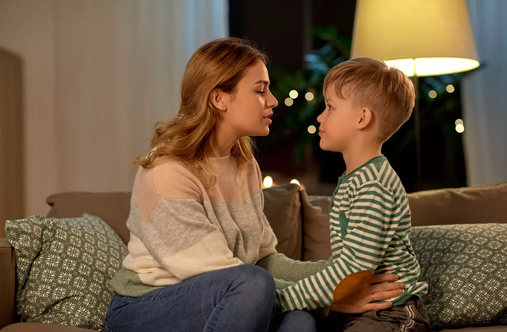 Mother talking to her son about empathy and kindness.
