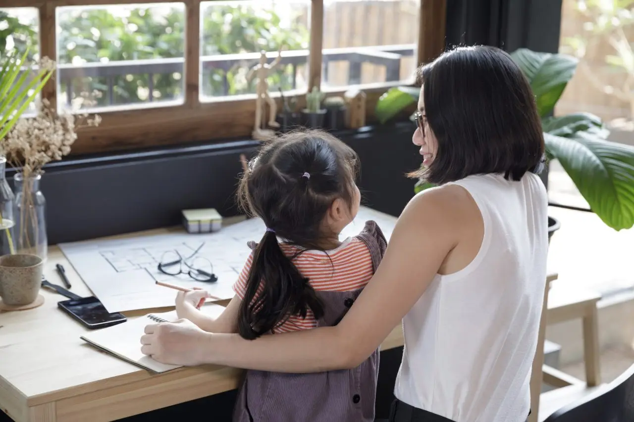 Child and mom do homework together, child gets frustrated when learning