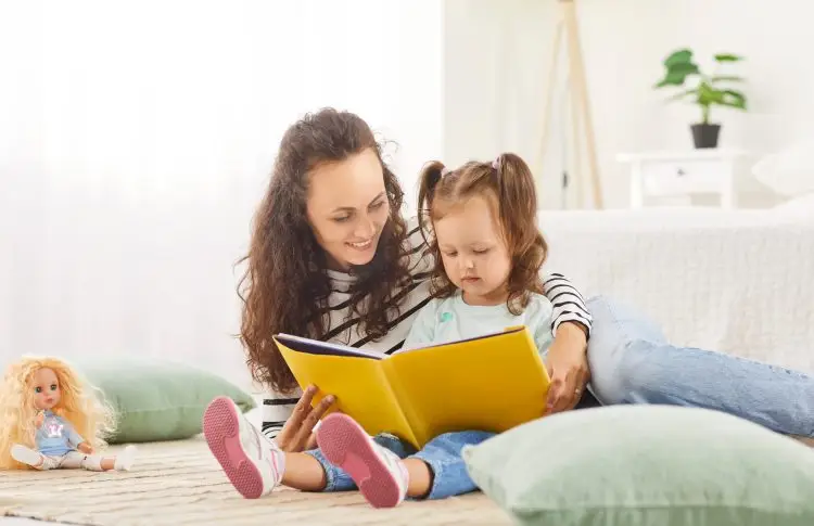 vocabulary activities at home, mom reading to young daughter at home
