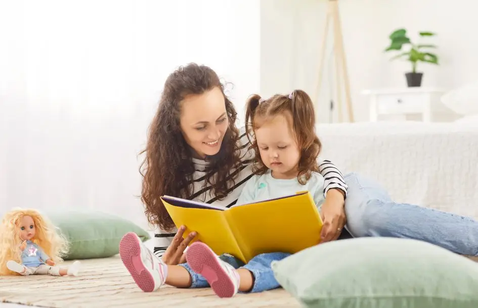 vocabulary activities at home, mom reading to young daughter at home